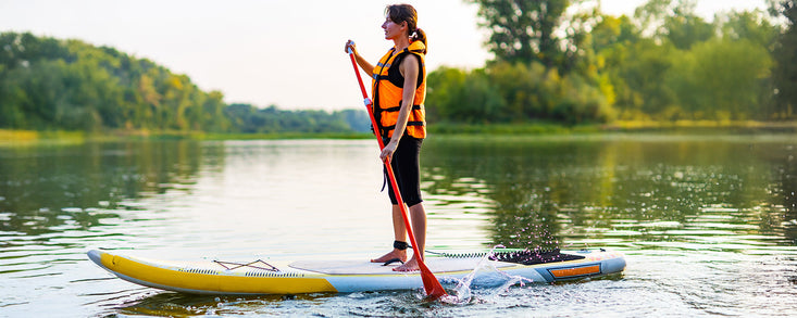 Woman wearing PDF While Paddleboarding