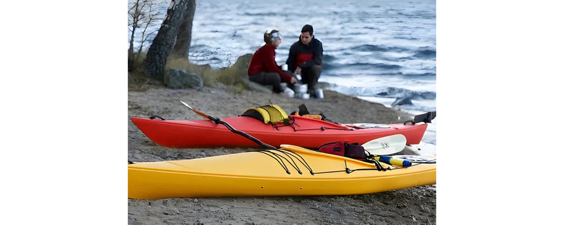 Couple ready for touring kayak