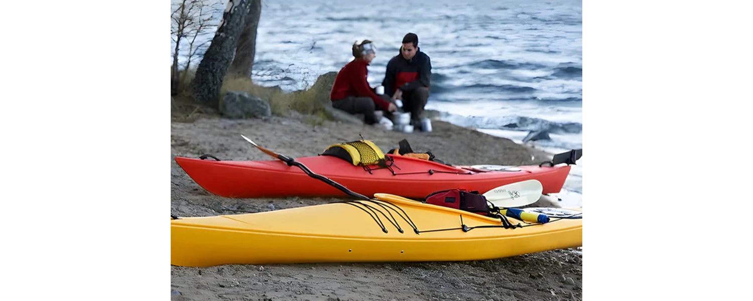 Couple ready for touring kayak